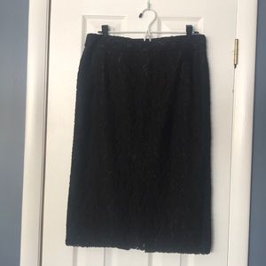 NWOT black pencil skirt with “lace” overlay